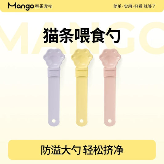 Three colorful pet feeding spoons with Mango branding on a yellow background